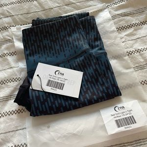 Zyia teal grid light n tight leggings